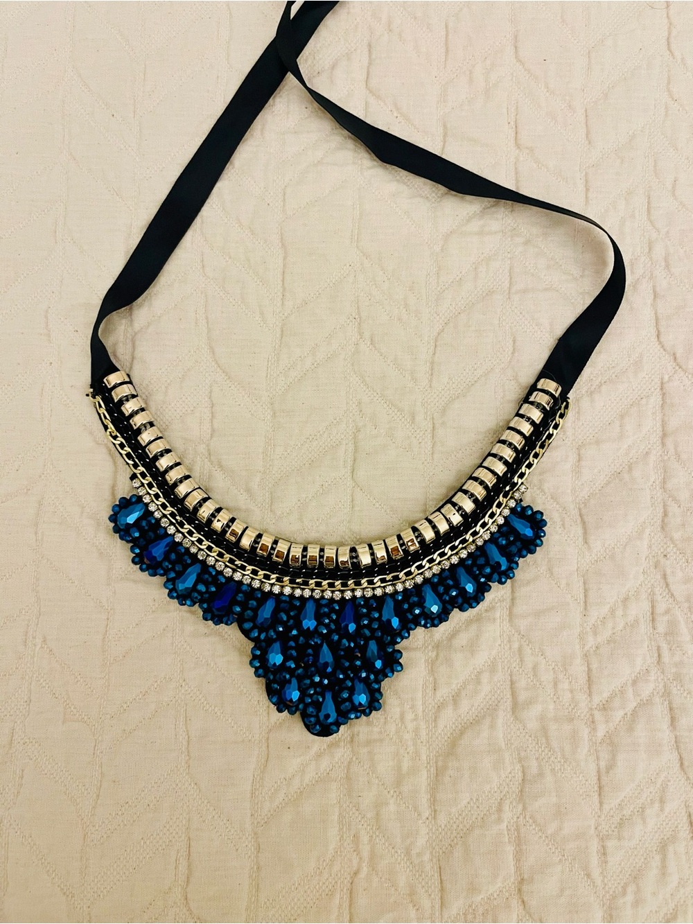 Statement Crystal Bib Necklace with Gold Accents and Black Ribbon